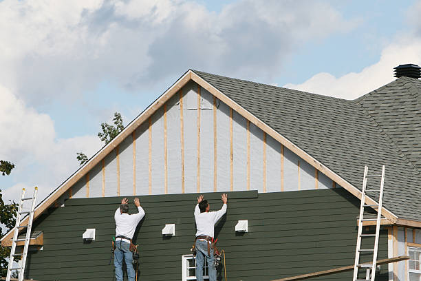 Professional Emergency Siding Repair technician working in Young America, MN